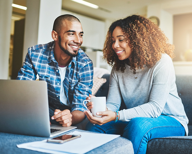 Black couple having an online couples therapy session in New York