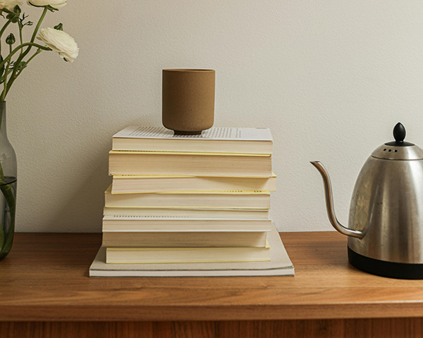 Cup of tea on top of a stack of books