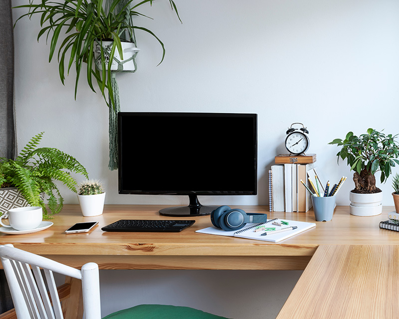 Desktop computer on a table for online therapy